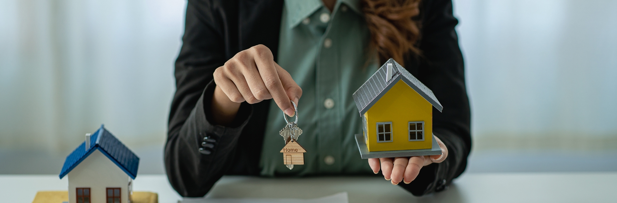 mortgage officer with keys to home