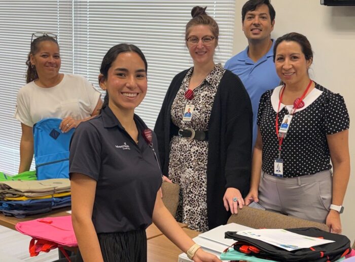 group of employees looking at camera